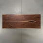 symmetry of a bookmatch Walnut table 40” wide x 108” long, finished in Pure D 