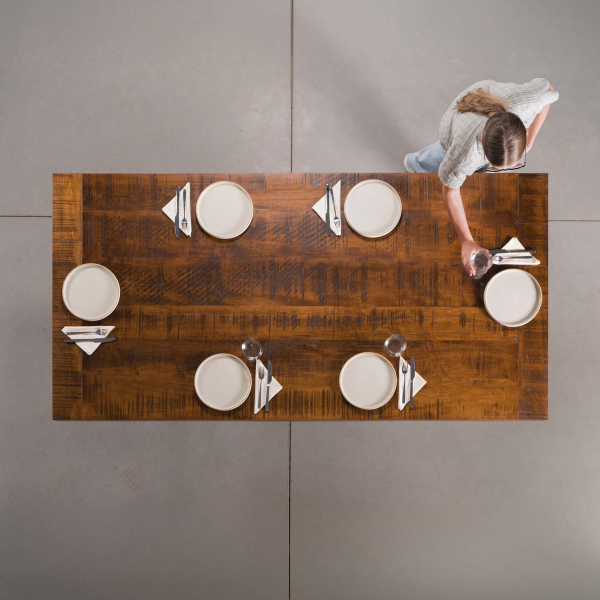 overhead view of a rustic maple trestle table finished in cinnamon; 42