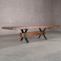 extended rustic maple trestle table finished in cinnamon; 42