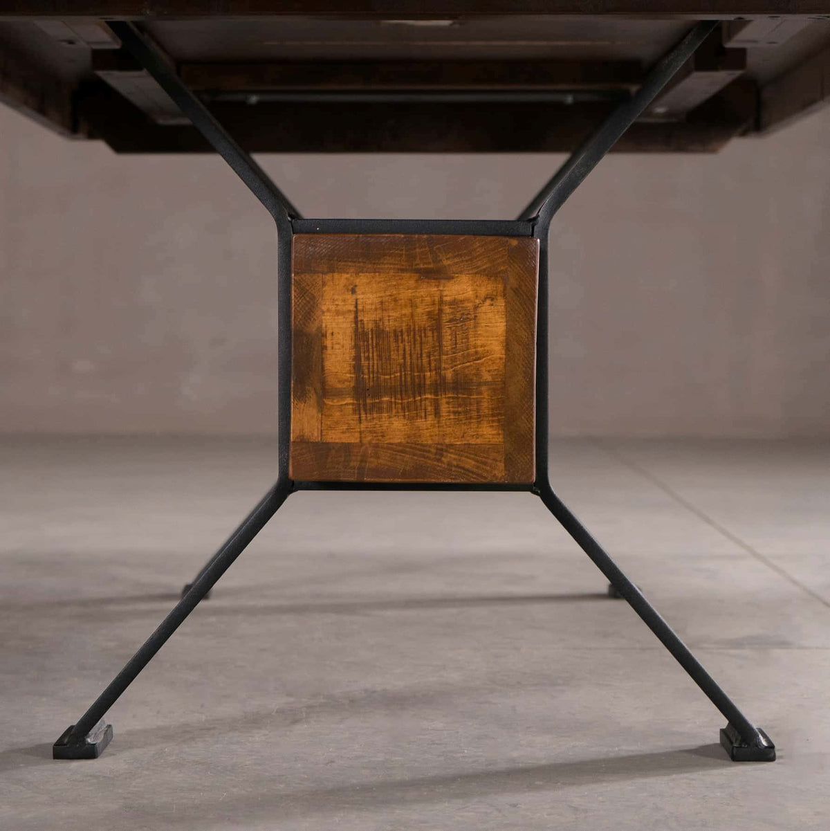 base view of a rustic maple trestle table finished in cinnamon; 42