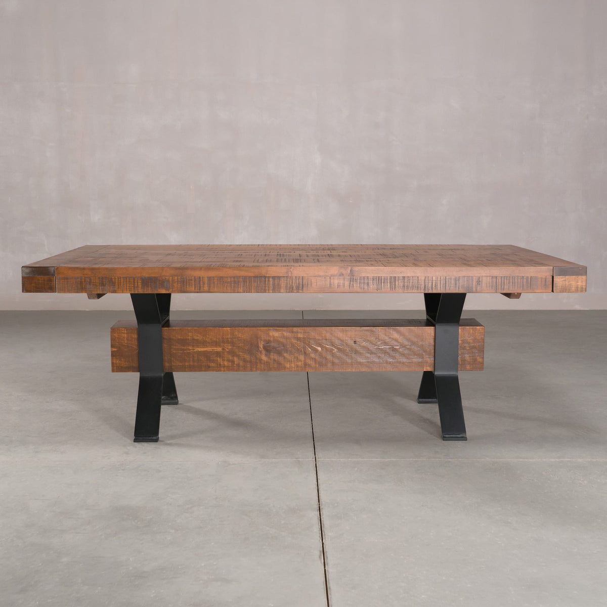 extendable rustic maple trestle table finished in cinnamon; 42