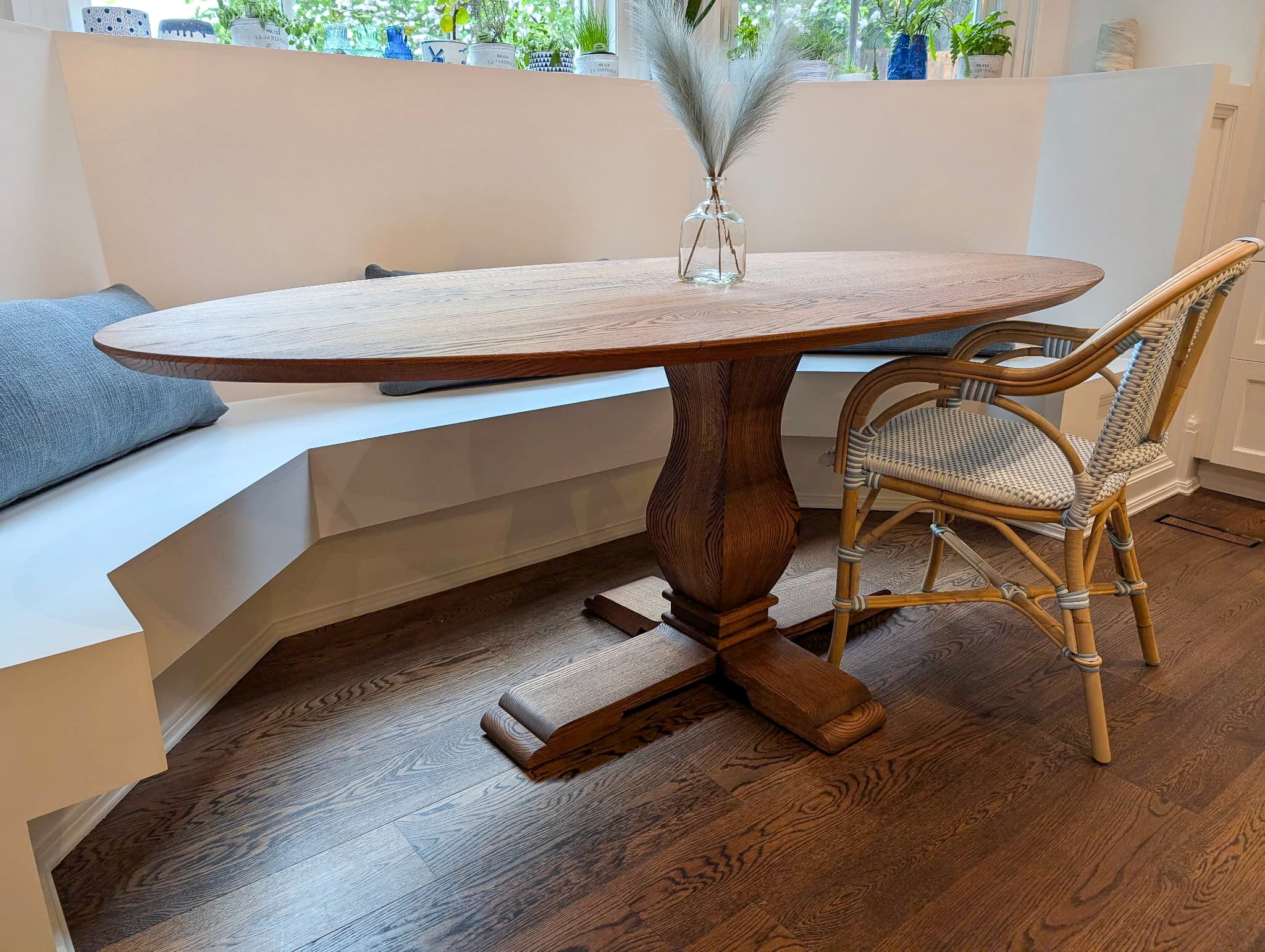 elliptical oval Red Oak table in Cocoa D on Granada base