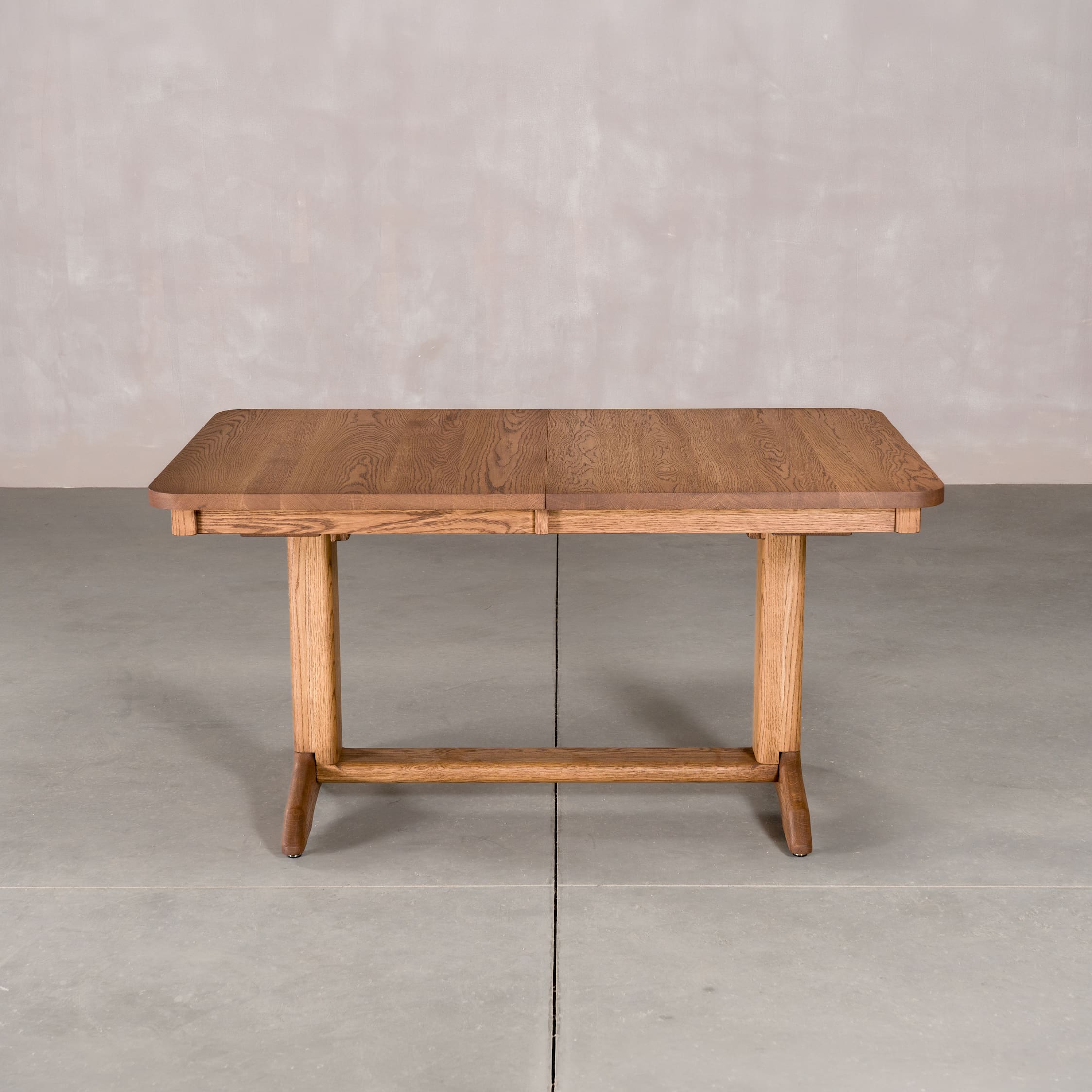 rectangle extendable Oak table 36 wide x 57” long, finished in Cortado D on Tobin base