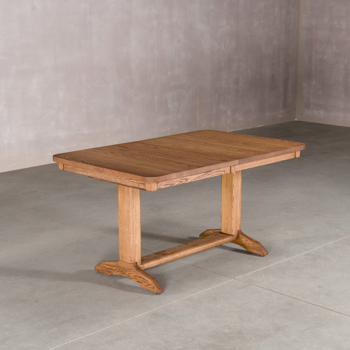 rectangle extendable Oak table 36 wide x 57” long, with 1-15” leaf finished in Cortado D on Tobin base
