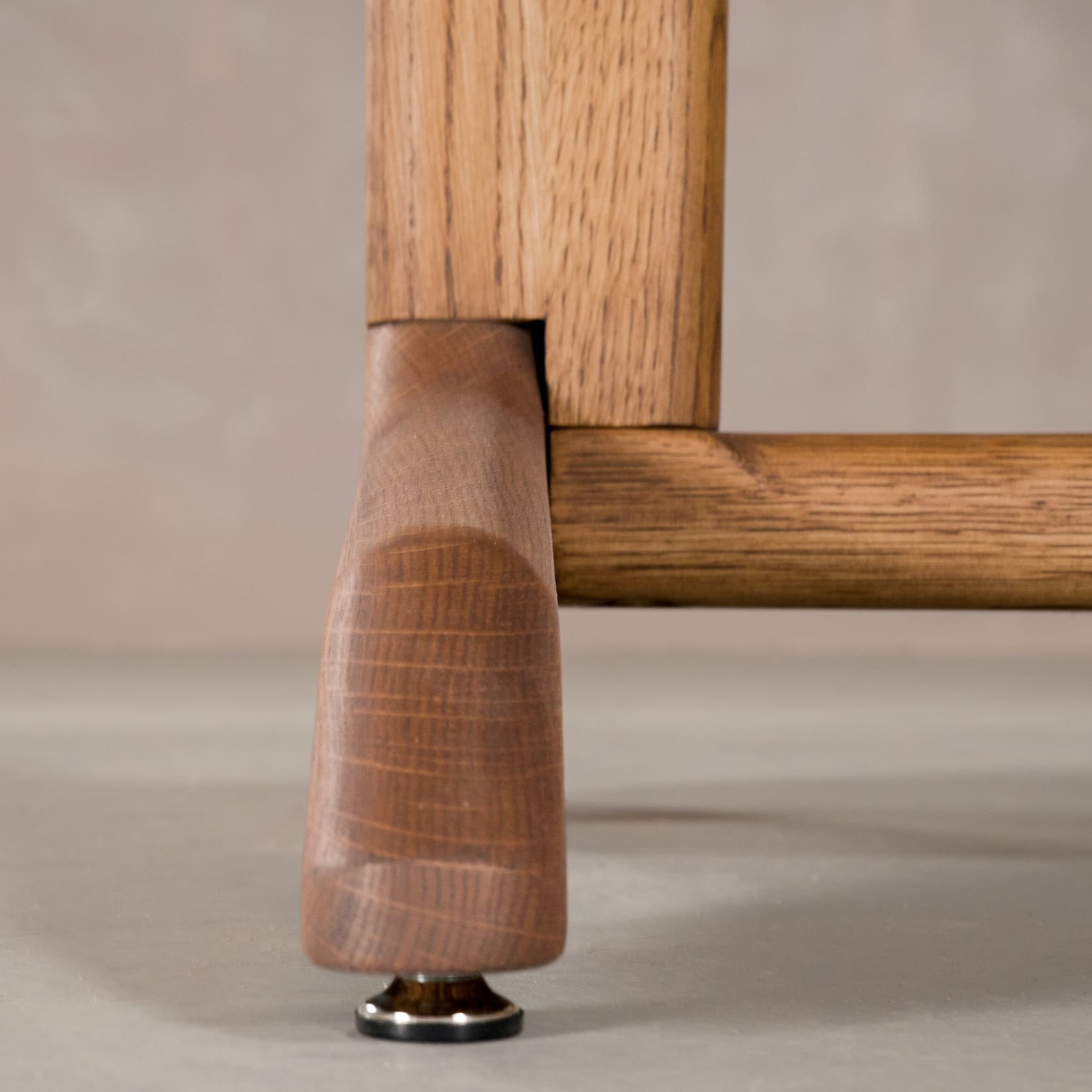 foot detail of a Tobin base on an Oak Extendable table finished in Cortado D