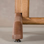foot detail of a Tobin base on an Oak Extendable table finished in Cortado D
