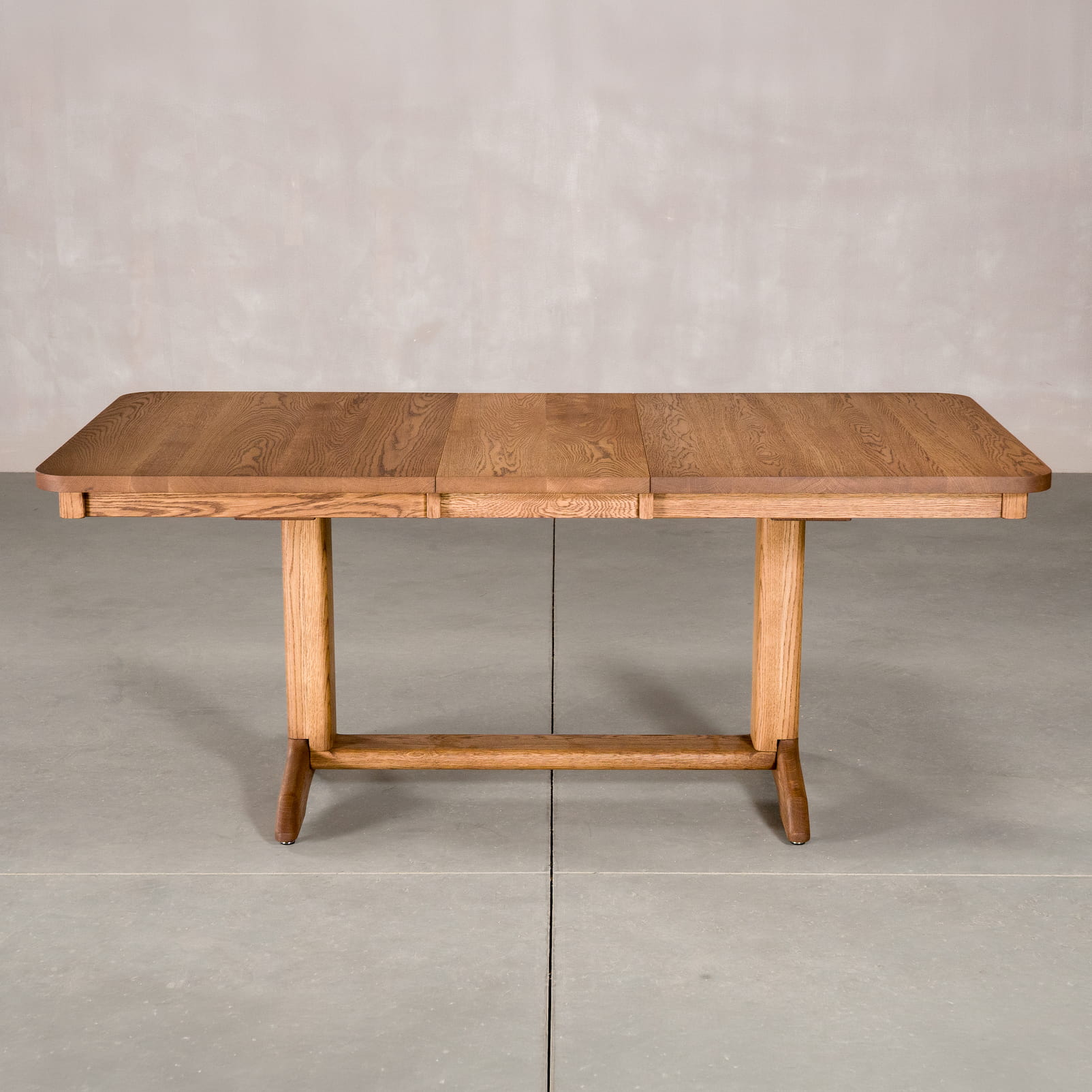 rectangle extendable Oak table 36 wide x 57” long, with 1-15” leaf finished in Cortado D on Tobin base