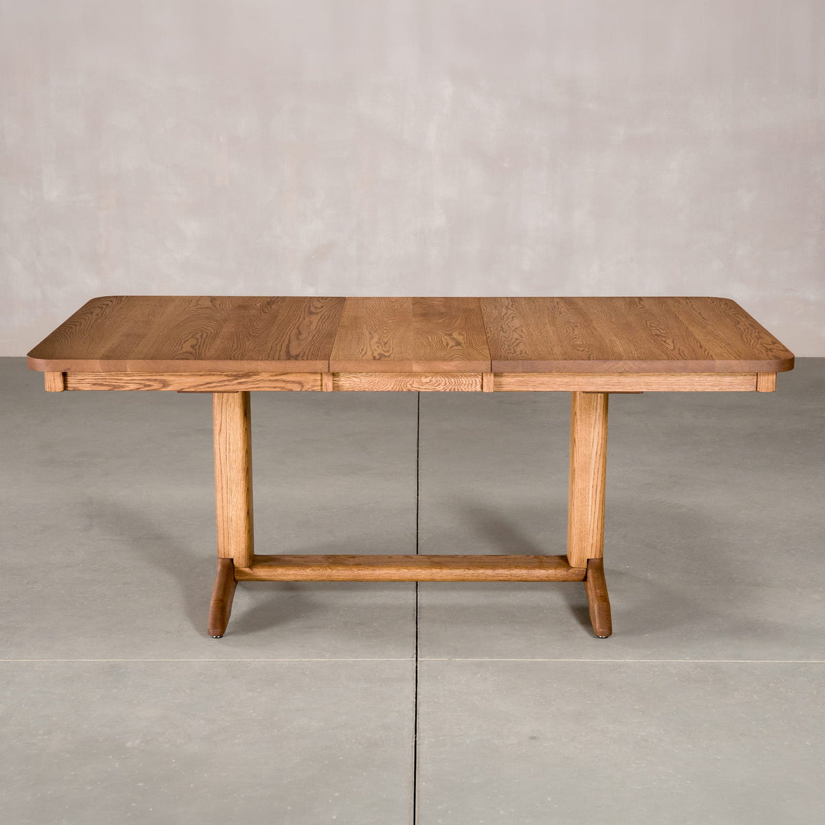 rectangle extendable Oak table 36 wide x 57” long, with 1-15” leaf finished in Cortado D on Tobin base