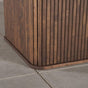 fluting and corner detail on a square Como pedestal base, Maple finished in Cortado W