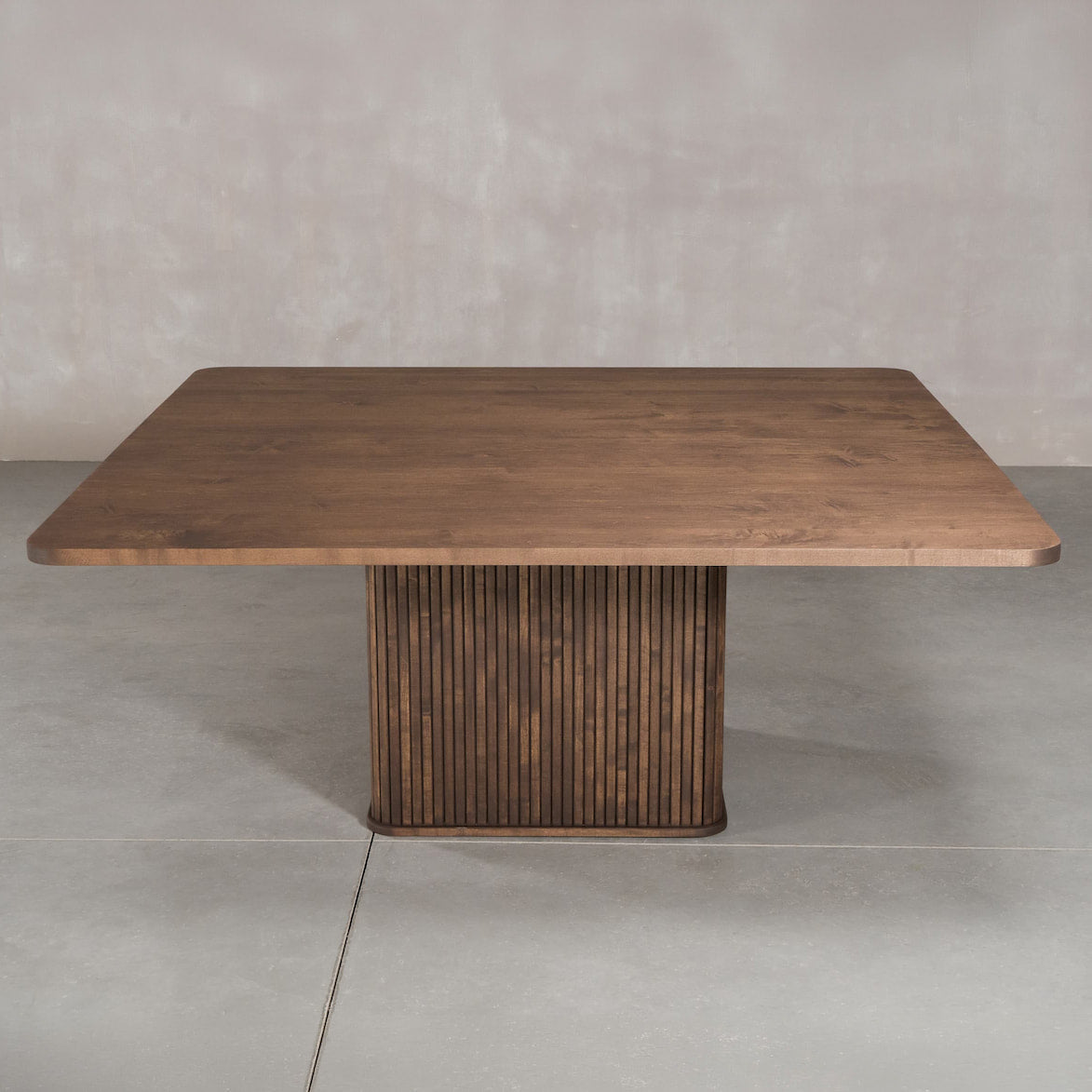 square Maple table 72” wide x 72” long, finished in Cortado W on Como pedestal