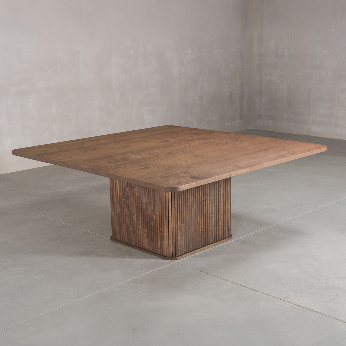 square Maple table 72” wide x 72” long, finished in Cortado W on Como pedestal