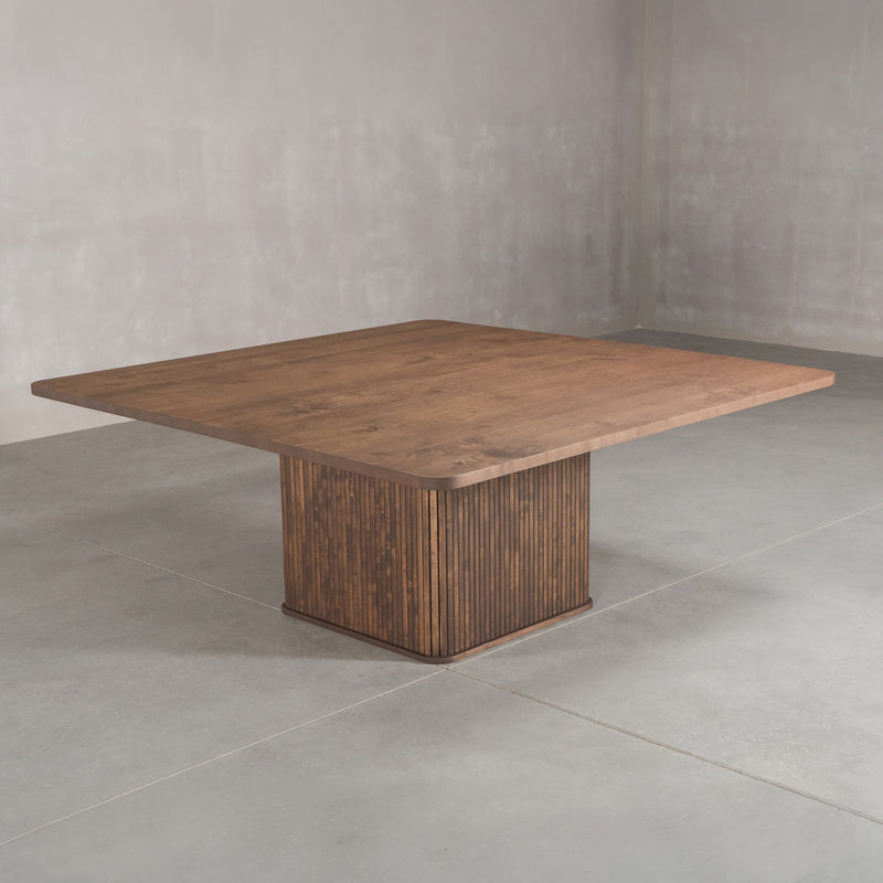 square Maple table 72” wide x 72” long, finished in Cortado W on Como pedestal