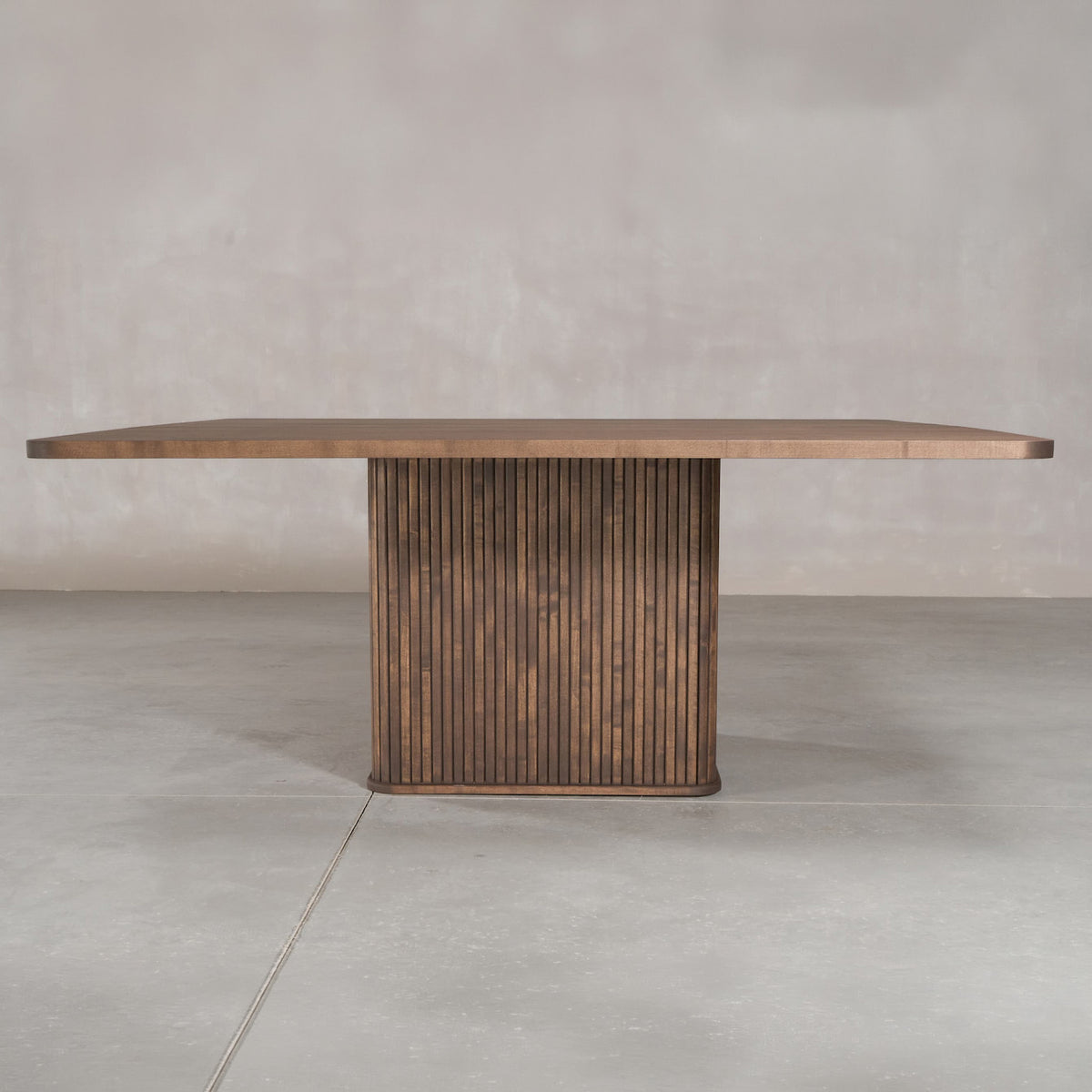 square Maple table 72” wide x 72” long, finished in Cortado W on Como pedestal