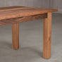 the skirt, leg and corner of a Parker base in Walnut finished in Pure D