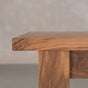the Seymour edge of rectangle Walnut table finished in Pure D on Parker base