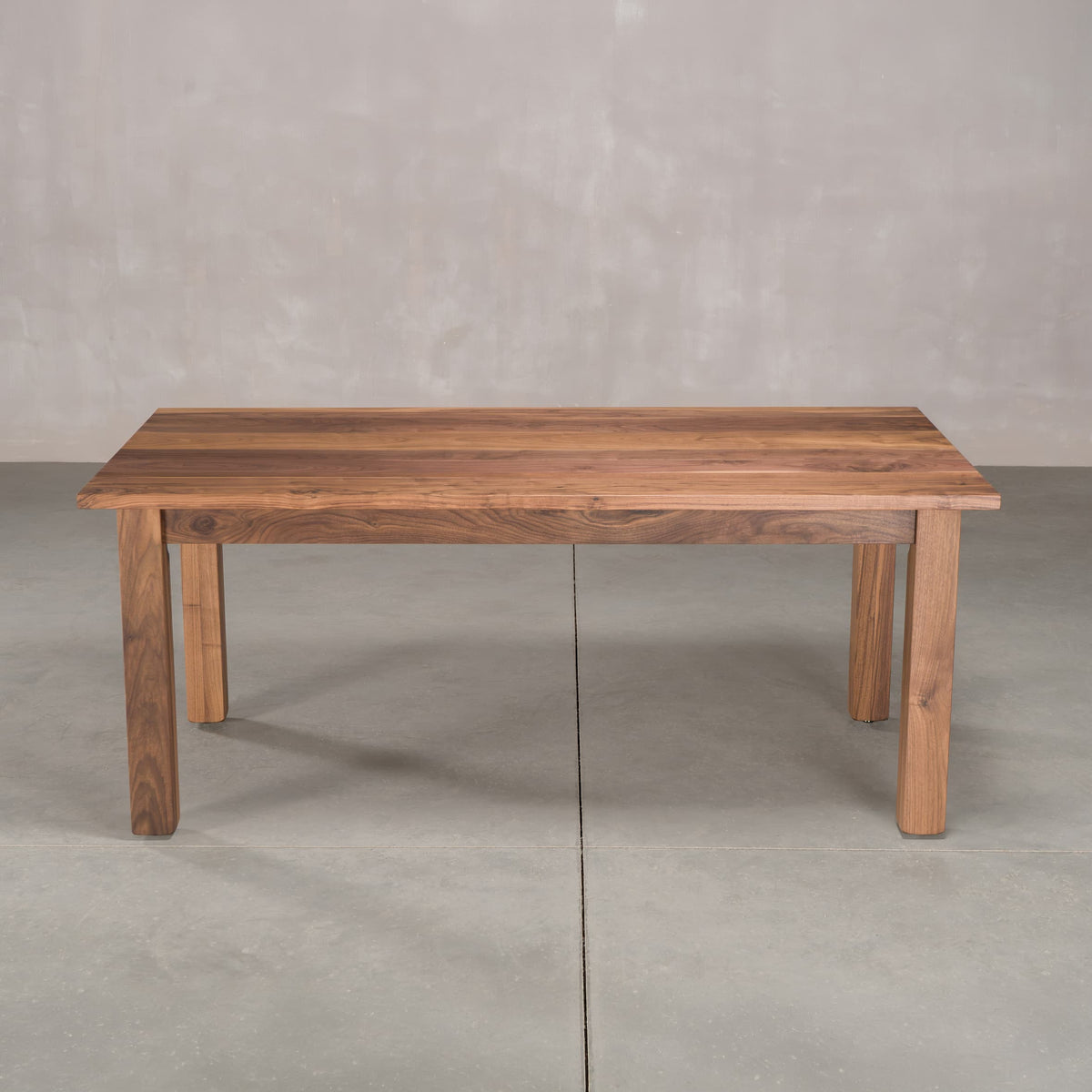 rectangle Walnut table 36” wide x 72” long, finished in Pure D on Parker base