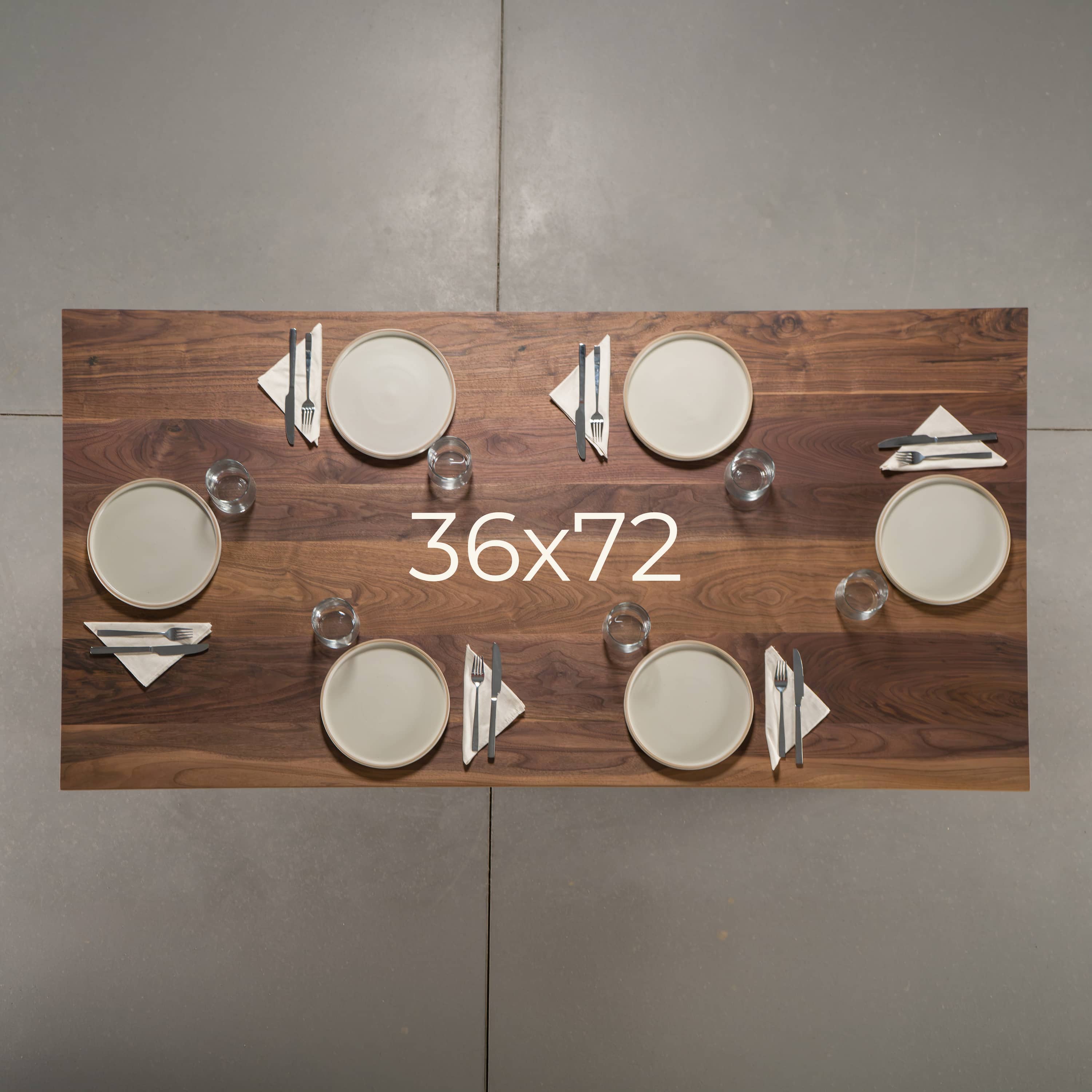 seating at a rectangle Walnut table 36” wide x 72” long, finished in Pure D 