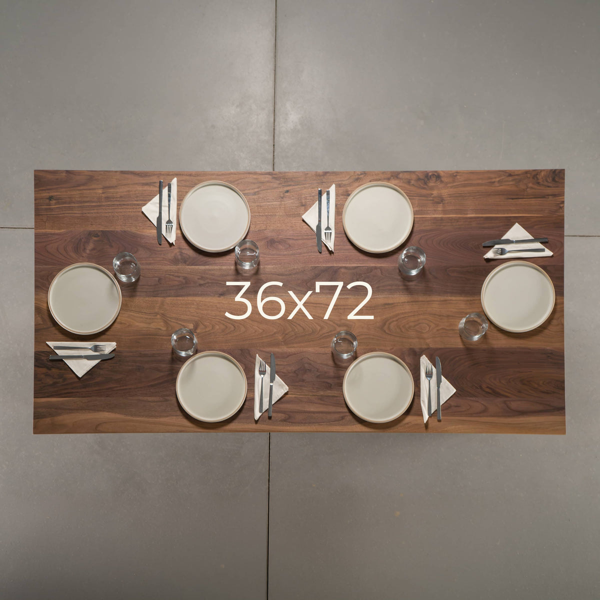 seating at a rectangle Walnut table 36” wide x 72” long, finished in Pure D 