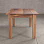 end view of rectangle Walnut table 36” wide x 72” long, finished in Pure D on Parker base