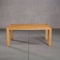 extendable Oak Parsons table 36” wide x 68” long, finished in Pure D on Estling base