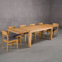 extendable Oak Parsons table 36” wide x 68” long, with 2-18