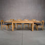 extendable Oak Parsons table 36” wide x 68” long with 2-18