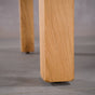 post legs of an Estling base in Oak finished in Pure D