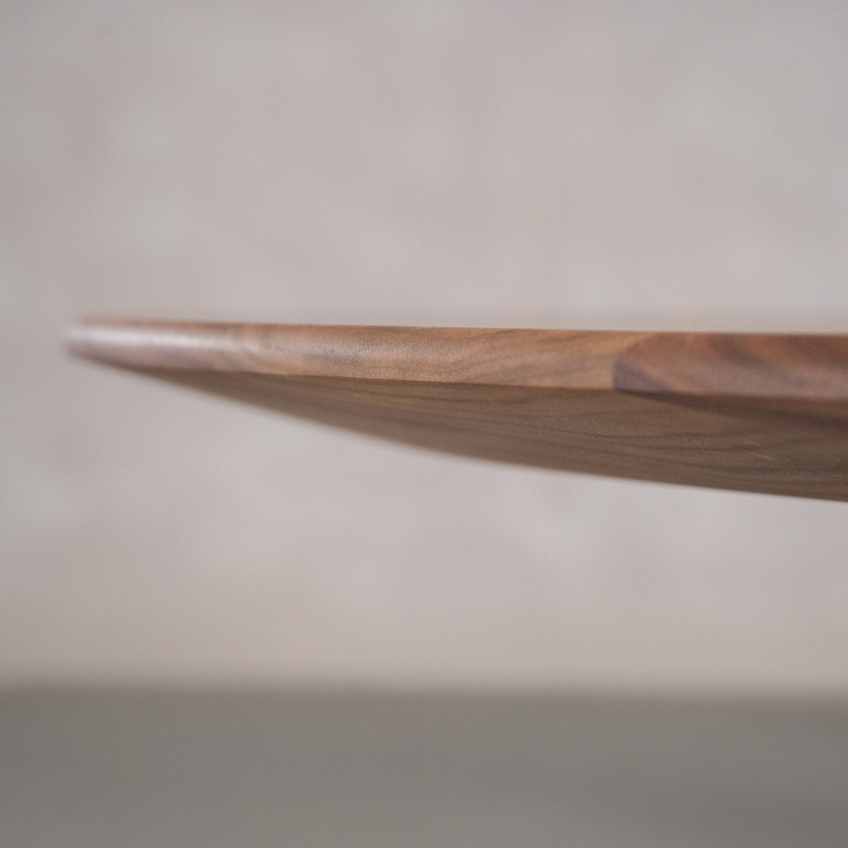 thinned Sarita edge on Walnut  table finished in Pure D