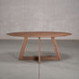 elliptical Walnut table 36” wide x 72” long, finished in Pure D on Moraine base