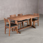 rectangle Walnut table 36” wide x 72” long, finished in Pure D on Tobin trestle base; shown with Walnut Aubrey chairs