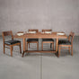 rectangle Walnut table 36” wide x 72” long, finished in Pure D on Tobin trestle base; shown with Walnut Aubrey chairs