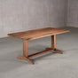 rectangle Walnut table 36” wide x 72” long, finished in Pure D on Tobin trestle base