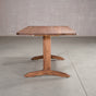 end view of rectangle Walnut table 36” wide x 72” long, finished in Pure D on Tobin trestle base