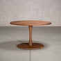 elliptical Walnut table 30” wide x 48” long, finished in Pure D on a Jennings pedestal base