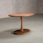 elliptical Walnut table 30” wide x 48” long, finished in Pure D on a Jennings pedestal base