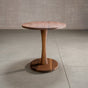 elliptical Walnut table 30” wide x 48” long, finished in Pure D on a Jennings pedestal base