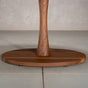 the Jennings pedestal base on an elliptical Walnut table finished in Pure D 