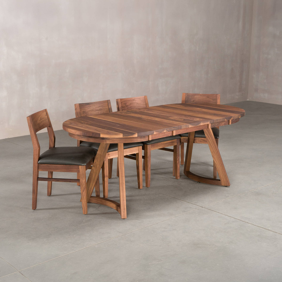 oval extendable Walnut table 36” wide x 60” long with 2-18