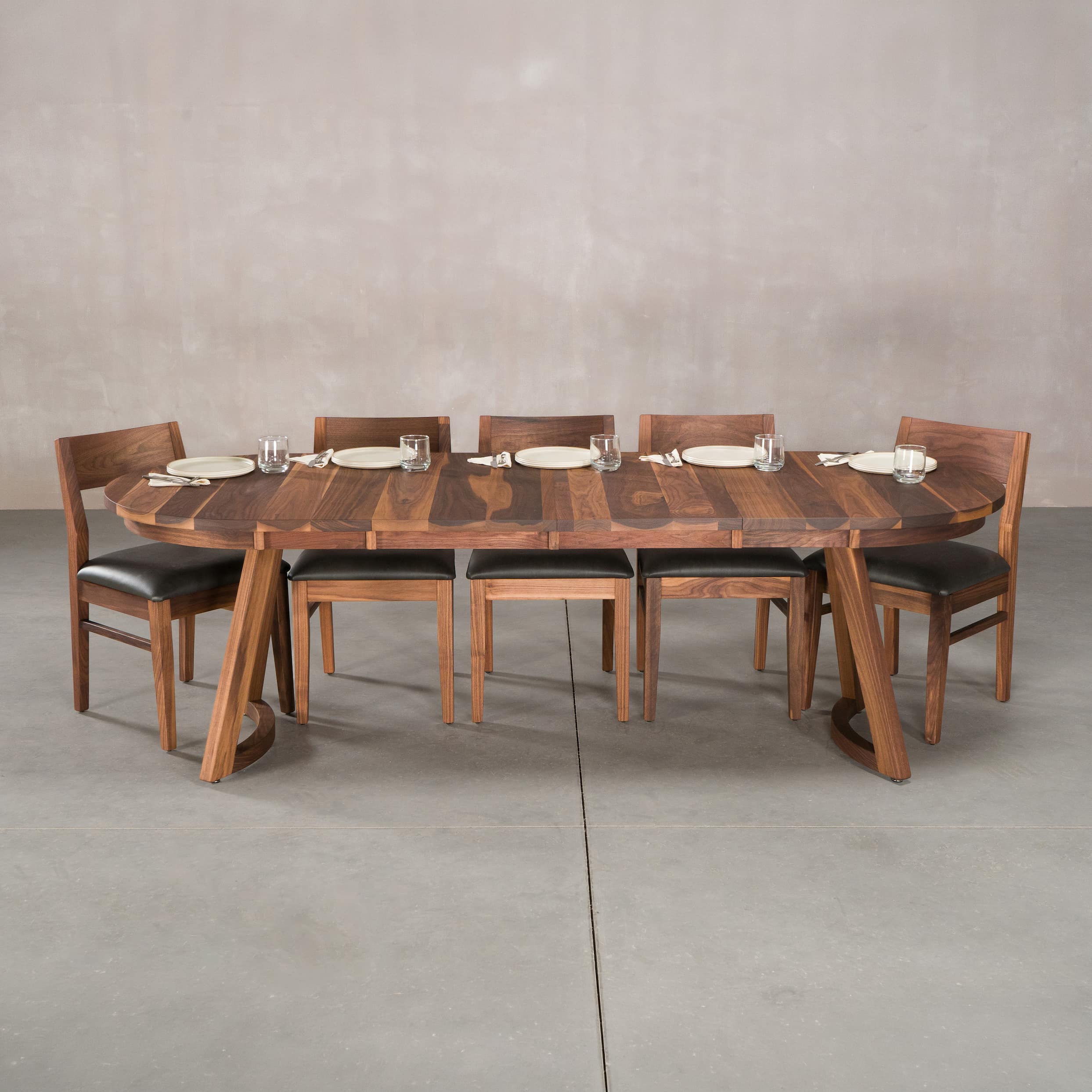 oval extendable Walnut table 36” wide x 60” long with 2-18