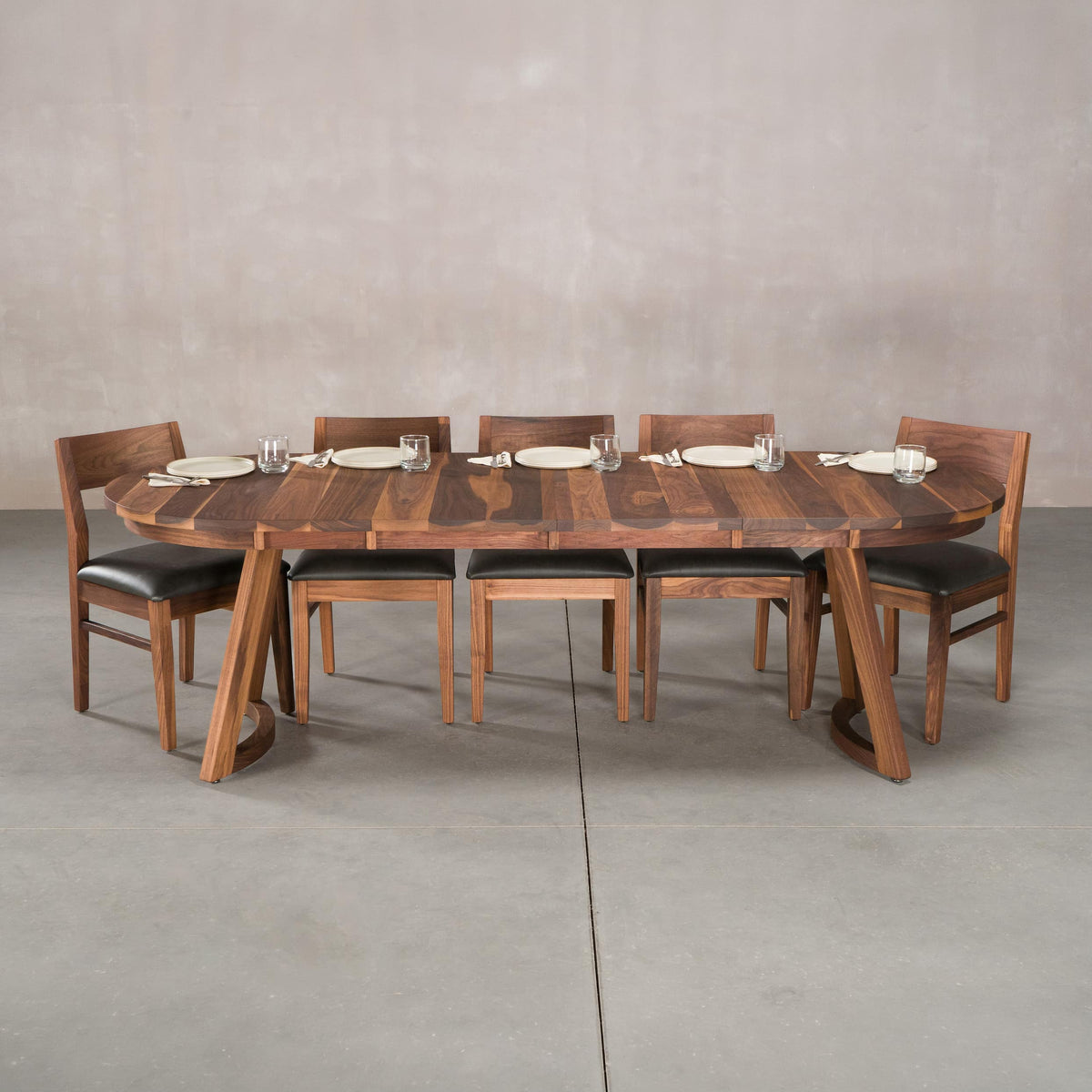 oval extendable Walnut table 36” wide x 60” long with 2-18