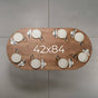 seating at racetrack oval Maple table 42” wide x 84” long, finished in Coconut W 
