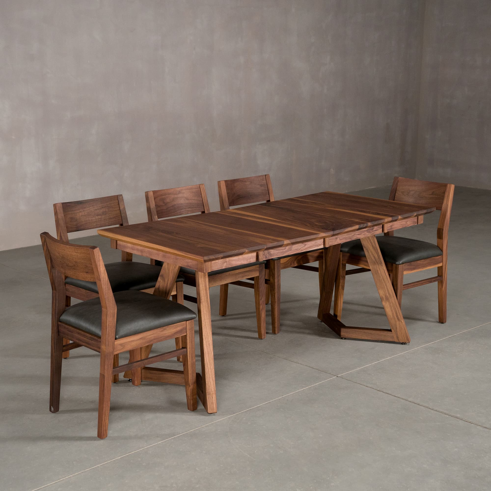 square extendable Walnut table 30” wide x 30” long with 2-18