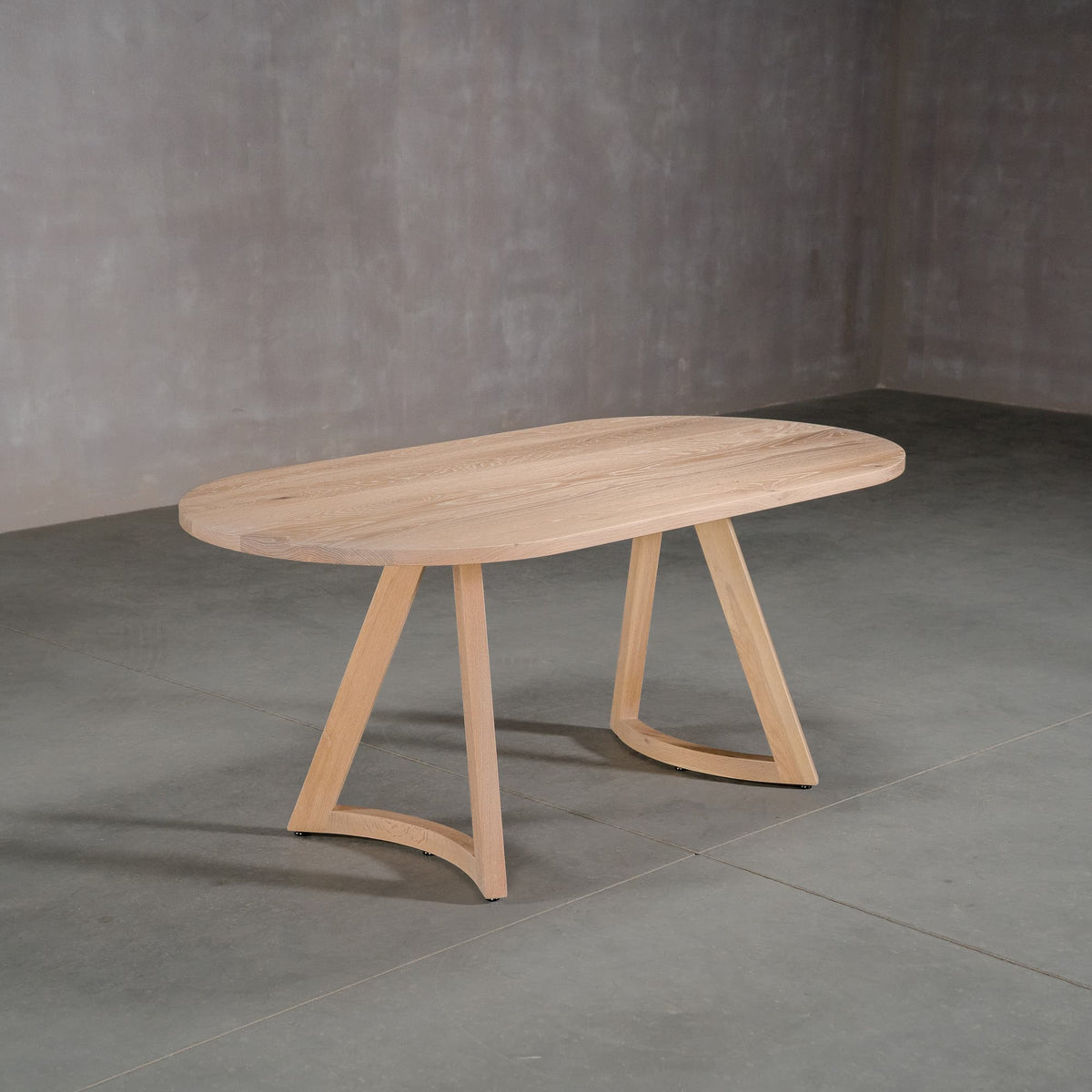 oval White Oak table 36” wide x 72” long, finished in Clear D on Chesbro legs