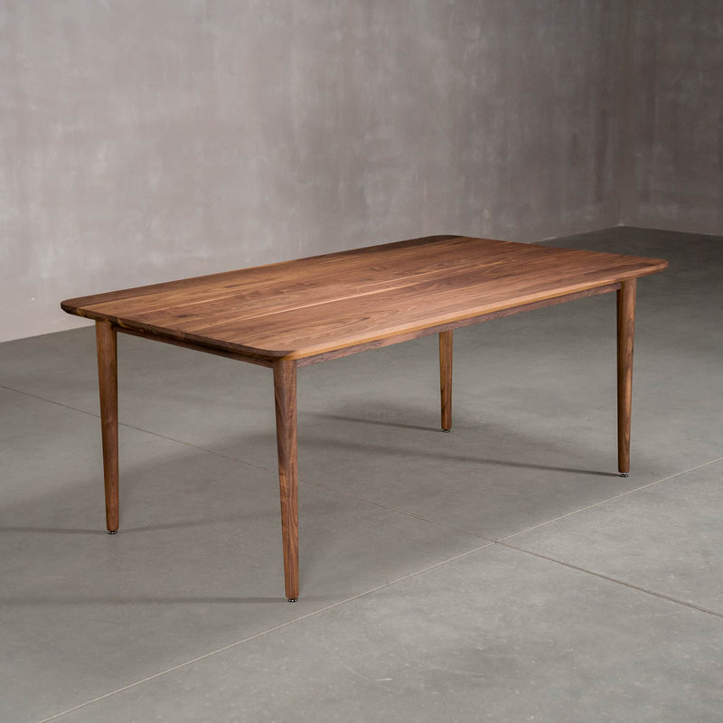rectangular Walnut table 42” wide x 72” long, finished in Pure D on Milford base
