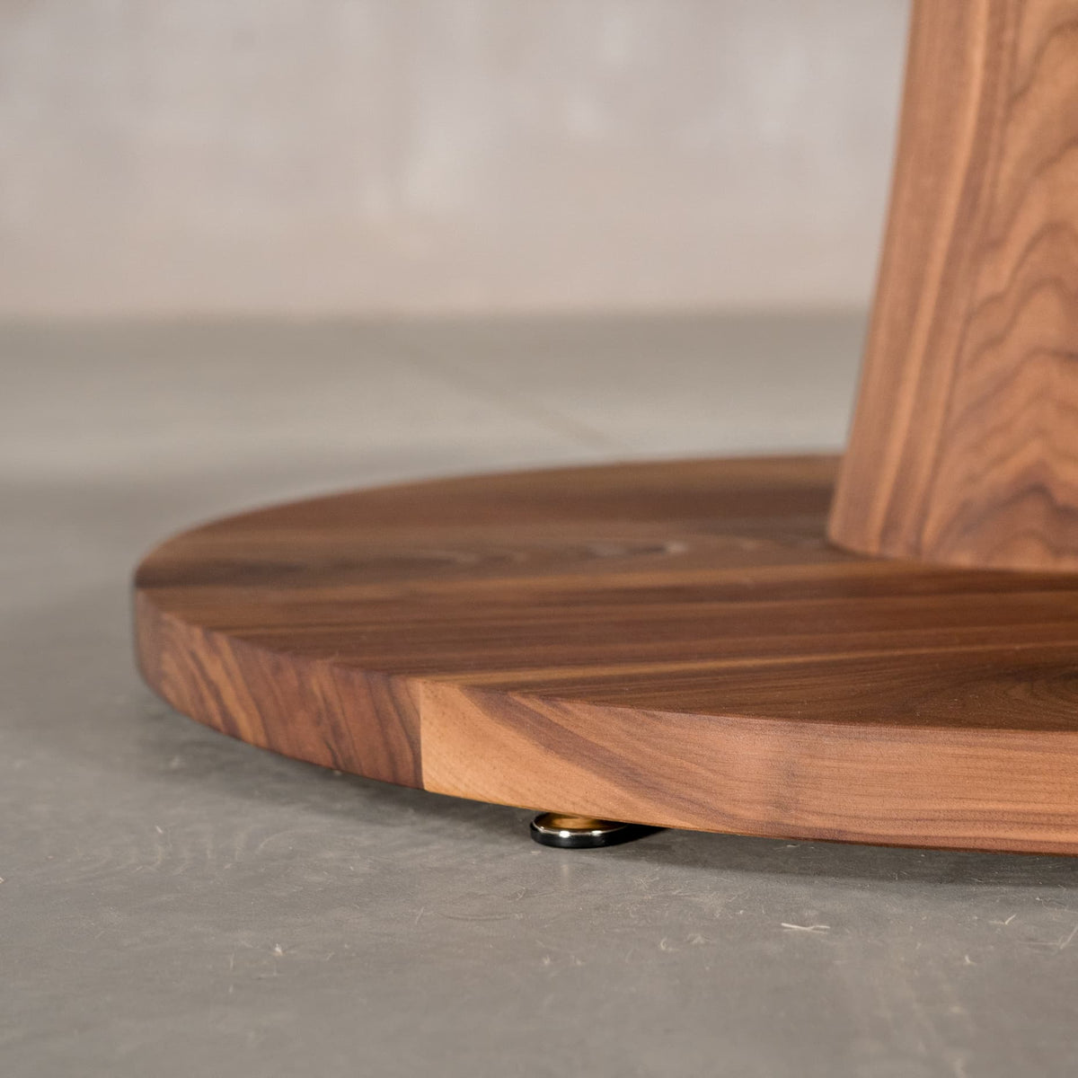 floor plate on a Jennings base on a round Walnut table finished in Pure D 