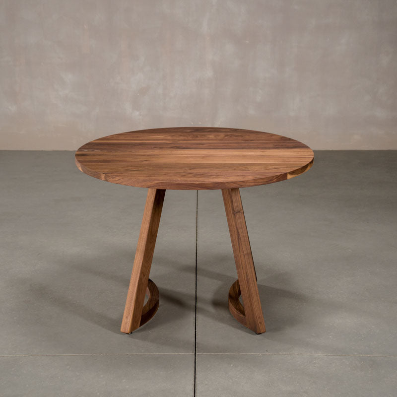 round  Walnut table 42” wide x 42” long, finished in Pure D on Chesbro legs