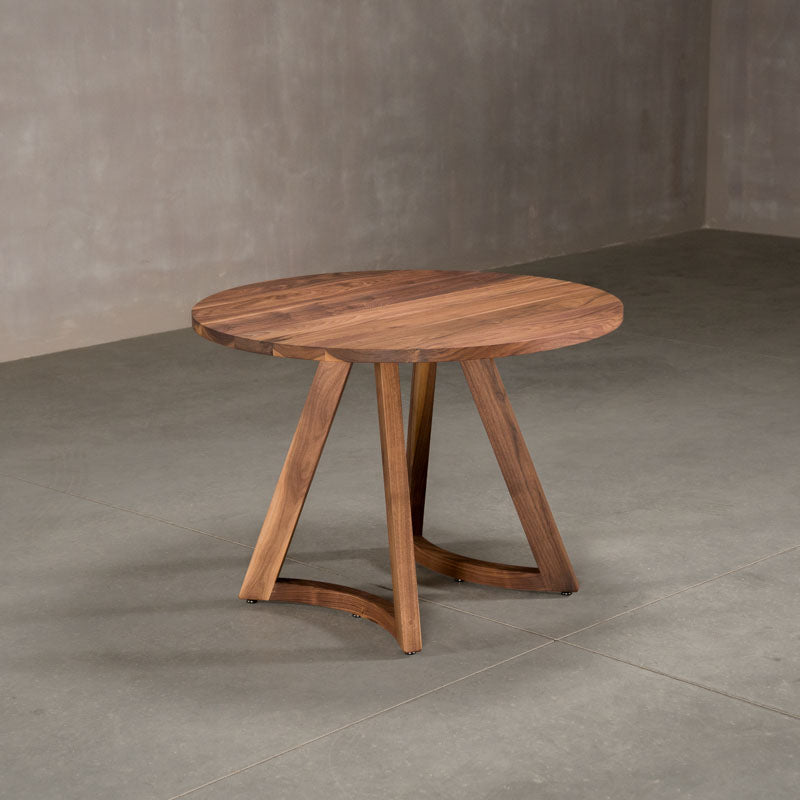 round  Walnut table 42” wide x 42” long, finished in Pure D on Chesbro legs
