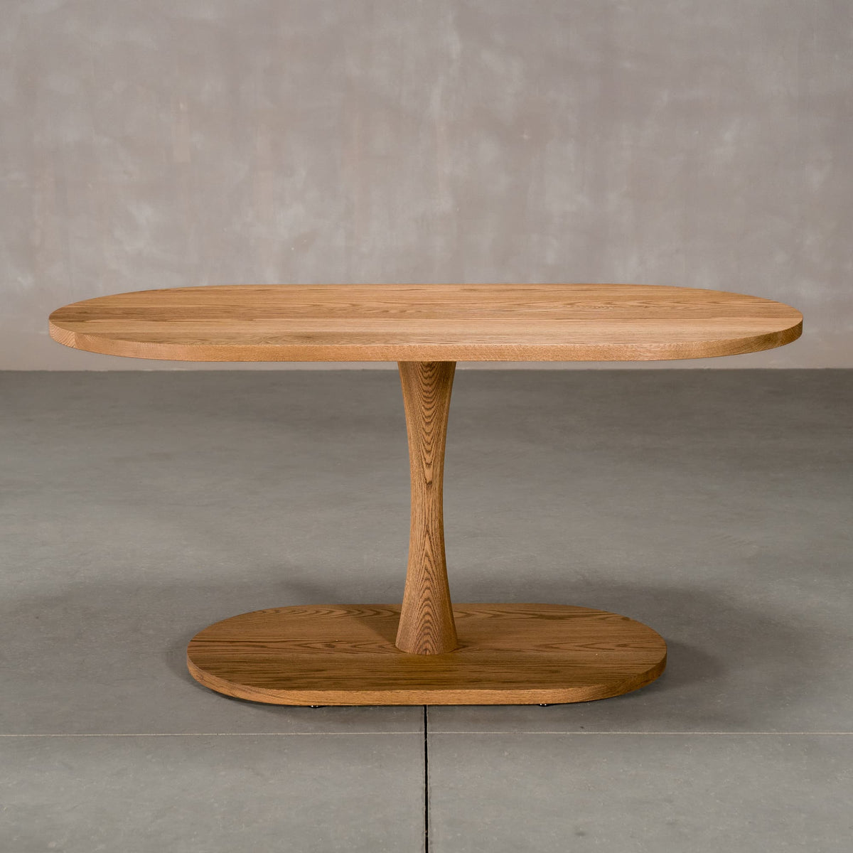 oval Red Oak table 32” wide x 60” long, finished in Castle Brown D on a Jennings pedestal base