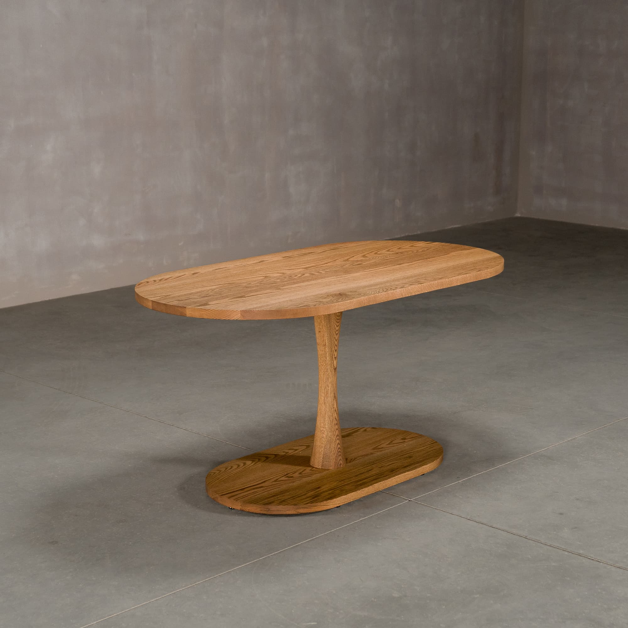oval Red Oak table 32” wide x 60” long, finished in Castle Brown D on a Jennings pedestal base