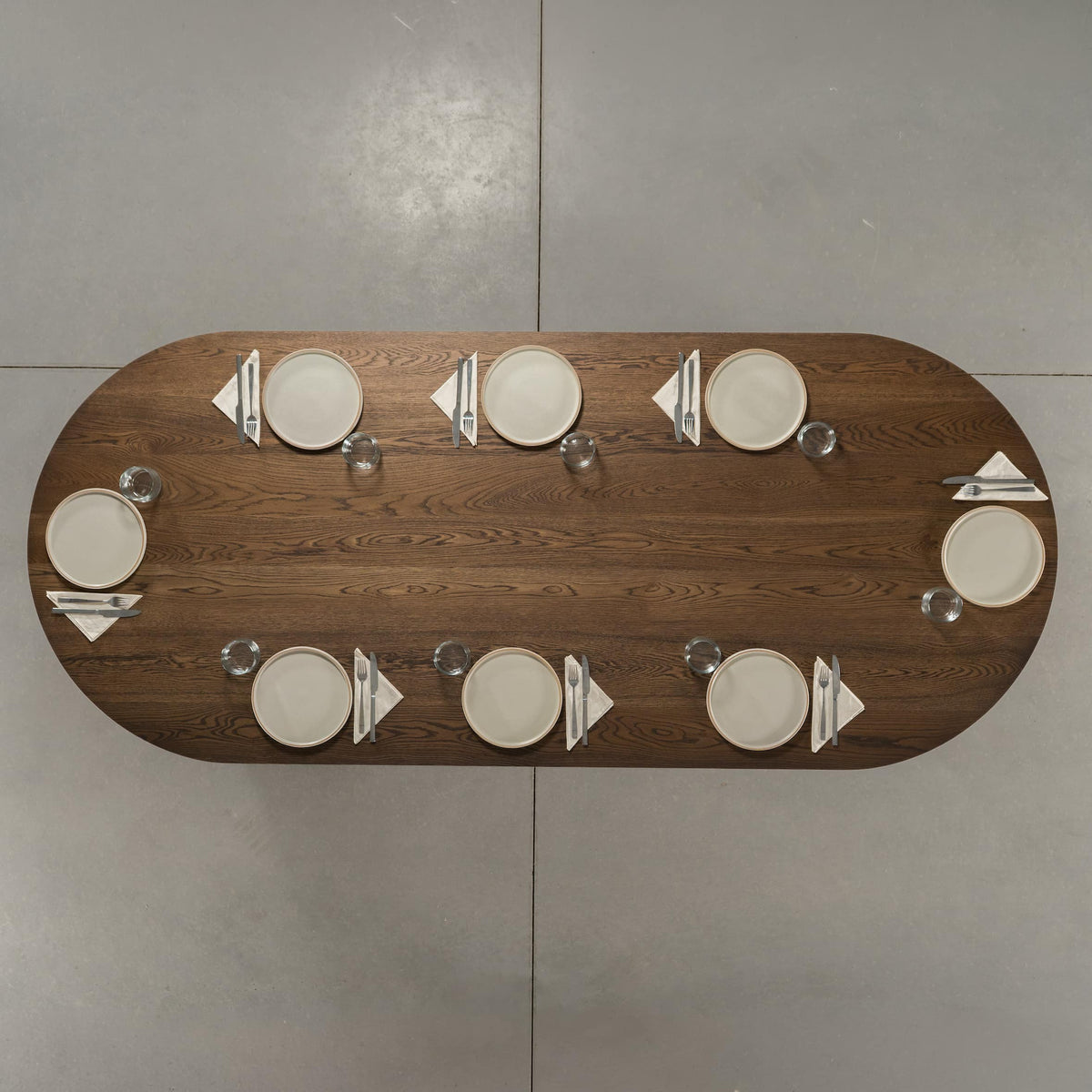 seating for 8 at a racetrack oval White Oak table 42” wide x 100” long, finished in Dark Roast D 